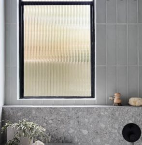 harga kaca jendela motif